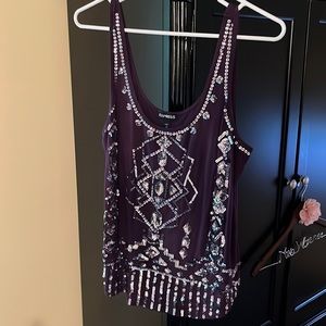 Embellished tank